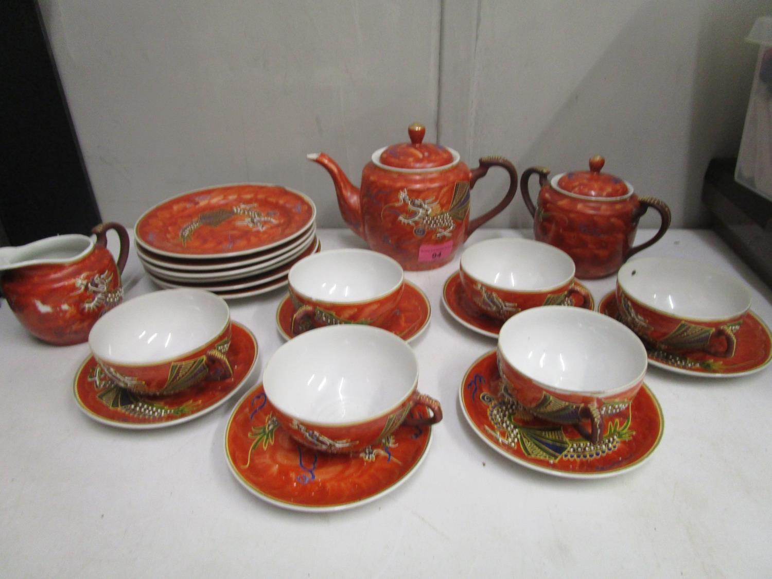 A Japanese early 20th century lithophane teaset decorated with dragons