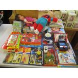 A mixed lot of toys and games to include Cabbage Patch Kids, Action Force, Star Wars, Beano comics