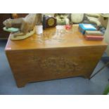 An Oriental camphor wood chest with inset drawers 25"h x 42"w