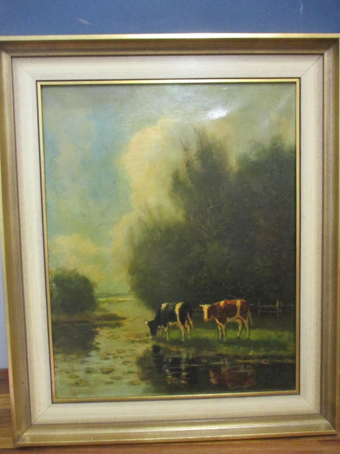 Early 20th century British School - cattle by a river, oil on canvas, framed