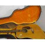 A retro Shelagh Jumbo 155 acoustic guitar, together with a music stand and a hard case