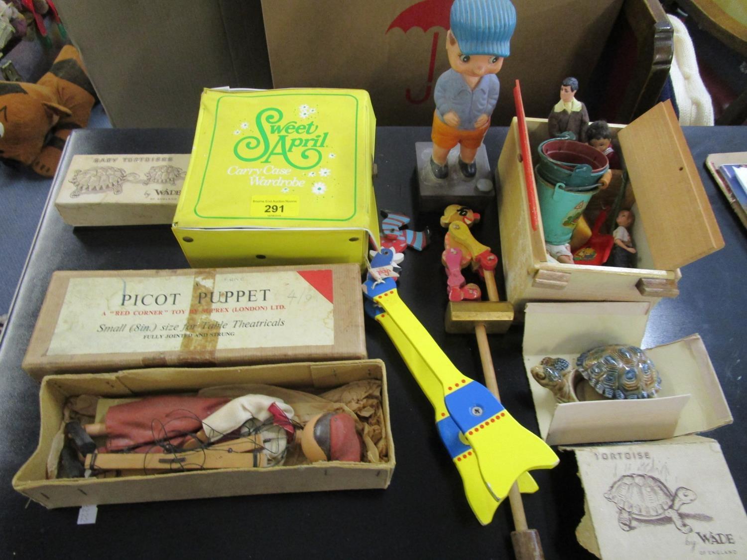 A mixed lot of toys to include a boxed Picot Puppet small 8" size, Sweet April carry case wardrobe