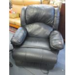 A leather upholstered reclining armchair