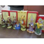 A collection of twelve Royal Doulton Bunnykins figurines to include Santa Bunnykins DB17,