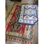 Two Kelim rugs having geometric designs and tasselled ends