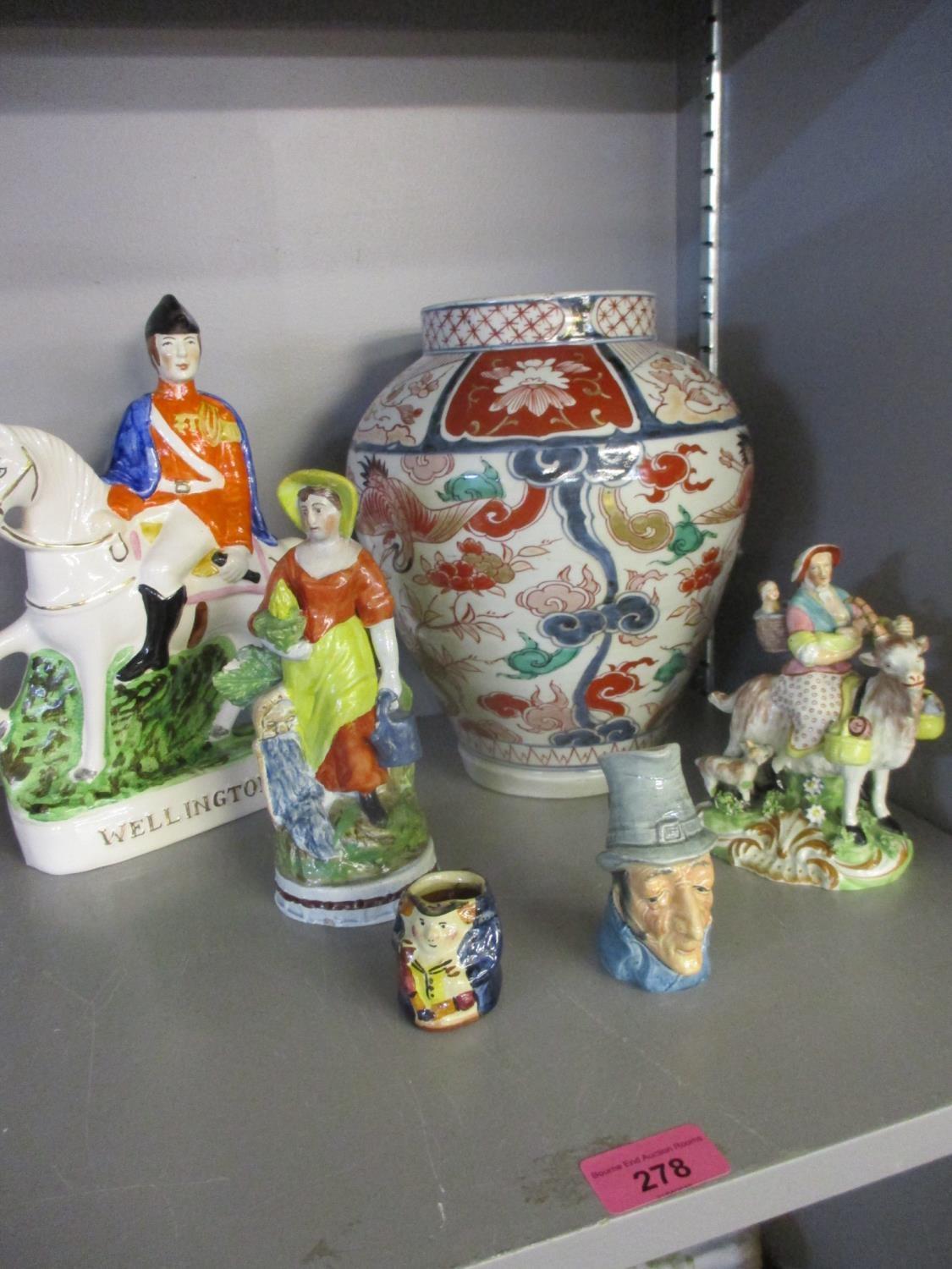 Three Staffordshire figures A/F, together with an Imari vase and two miniature character jugs