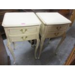 A pair of reproduction French cream painted bedside tables 27 1/2"h x 15"w