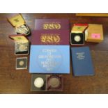 A selection of coins to include a 1983 silver proof coin in a Royal Mint box, a Prince Charles