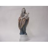 An early 20th century KPM figurine of Madonna and child, on a plinth, with four factory marks and