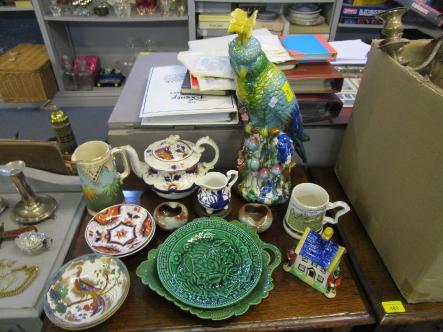 A mixed lot of ceramics to include an oriental pottery cockatoo, a Gaudy Welsh teapot, green leaf