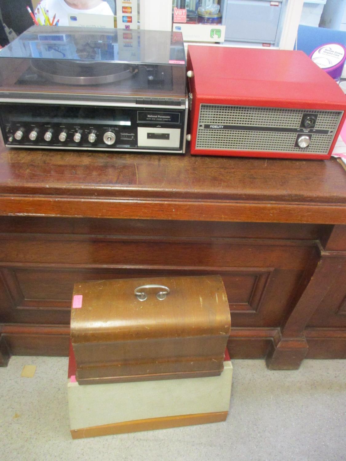 A National Panasonic turntable/cassette player, two sewing machines and a record player