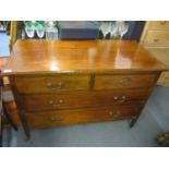 An Edwardian mahogany chest of two short and two long drawers