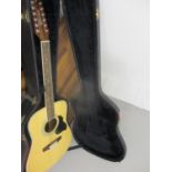 A retro Crafter acoustic guitar with hard case