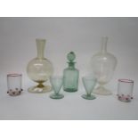A selection of early 20th century Venetian glass to include a yellow tinted carafe of globular