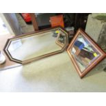 A rectangular eight sided wall mirror with bevelled glass and one other, a rectangular gilt framed