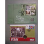 A 2009 Kew Gardens 50p coin and stamp cover in its original presentation card and envelope, along