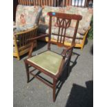 An Edwardian mahogany chair having tapering legs and string inlay decoration