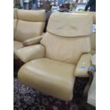 A Stressles swivel reclining single armchair upholstered in Palma leather