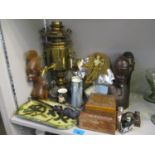 A mixed lot to include an Art Deco style mirror, African treen busts, carved boxes, a Carn pottery