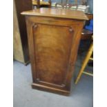 A Victorian mahogany side cabinet having single cupboard door revealing fitted shelves