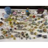 A large quantity of late 20th century trinket, pill, thimble and ornamental boxes to include