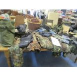 A large selection of pigeon shooting equipment to include camouflage and hide materials,