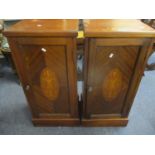 A pair of Edwardian inlaid mahogany pot cupboards