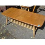 A light Ercol two tier coffee table 14 1/2"h x 41"w