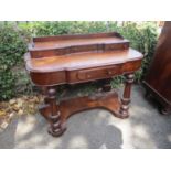 A Victorian mahogany Duchess dressing table with later raised back A/F 34"H x 42"