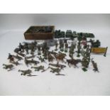 A quantity of lead soldiers including Britains, a quantity of lead ships including Dinky Toys, a