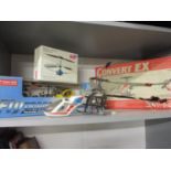 A Kyosho radio controlled electric powered helicopter A/F with original box, a Science Museum remote