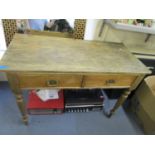 A pine two drawer side table with fitted cutlery interior on turned legs 30 3/4" x 45" x 21 1/4"