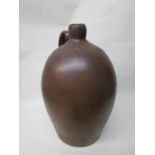 A 19th century large stoneware flagon of ovoid form with a neck and handle stamped Imperial No.201