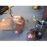 Metalware to include a copper coal scuttle, fire irons and a copper jug