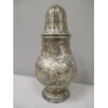 A 19th century white metal repousse sugar castor