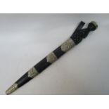 A Scottish dirk, the carved wooden handle with a silver plated cast top, the blade stamped Fenton,