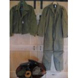 An Aircrew MK14A Nato airman's coverall, two mid 20th century aircrew flying helmets, two RAF