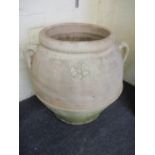 A large terracotta olive oil jar with strap handles, 27" h