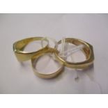 Three 9ct gold gents rings, two set with diamond chips, 9g