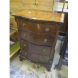 A modern mahogany four drawer, serpentine fronted chest on bracket feet, 27 1/2"h x 19"w