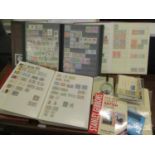 Five albums of stamps and loose stamps from around the world