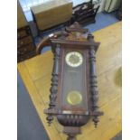 A late 19th century mahogany Vienna regulator wall clock