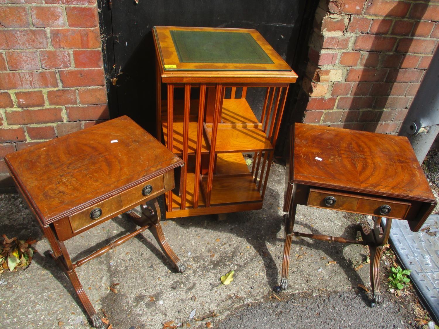 A pair of modern mahogany finished, single drawer occasional tables with fall flaps, on lyre