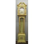 A reproduction painted long case clock, the dial having an arched top, floral spandrels and Roman