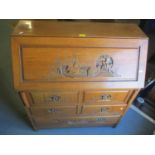 A mid 20th century oriental hardwood bureau having fall flap above four drawers, 41" h x 36"w