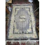 A Chinese part silk rug with floral panels and spandrels, 73" x 48"