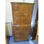 A reproduction burr walnut veneered, bow fronted chest of six long drawers, 51" h x 21 1/2"w
