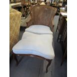 A mid 20th century French walnut Duchess Brisee cane back chair and stool