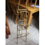 An early 20th century folding brass music stand