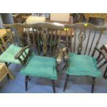 A set of six late 20th century stained beech, pierced back dining chairs